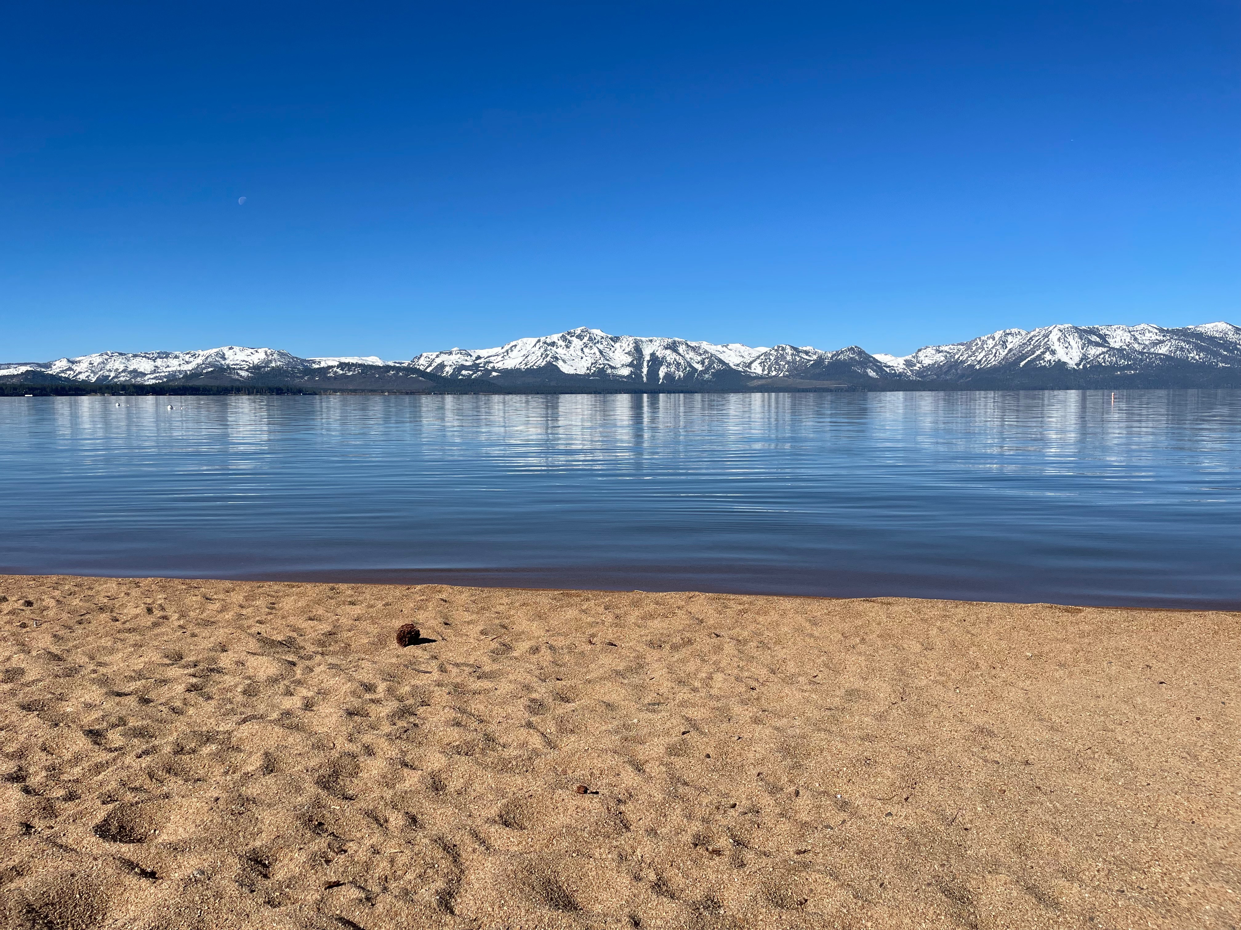 Lake with snow-capped mountains